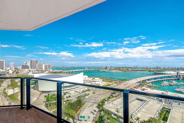 balcony featuring a water view