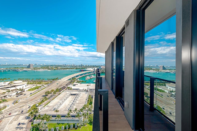 balcony featuring a water view