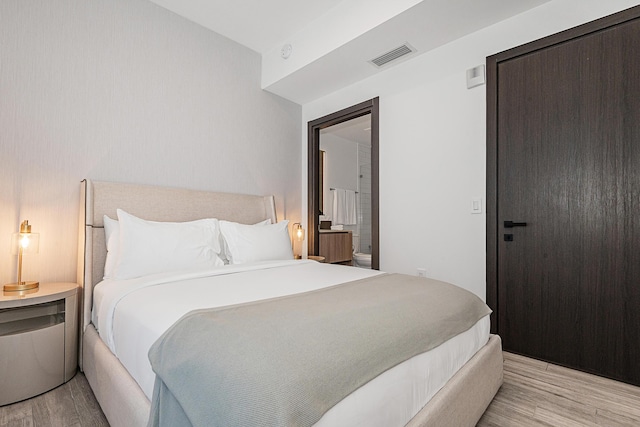 bedroom featuring light hardwood / wood-style flooring