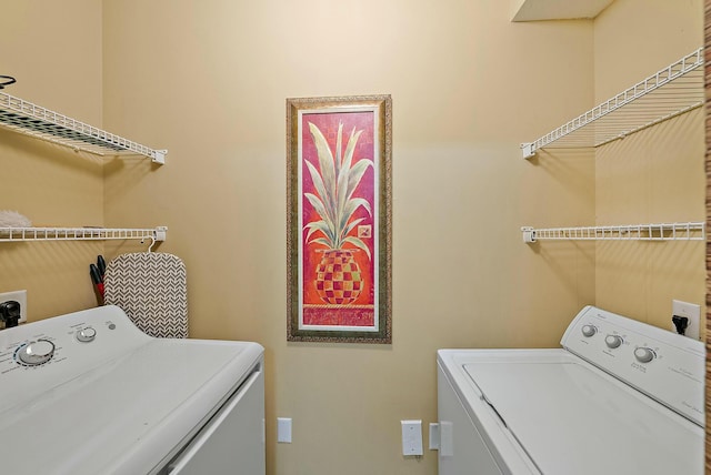 laundry room featuring independent washer and dryer