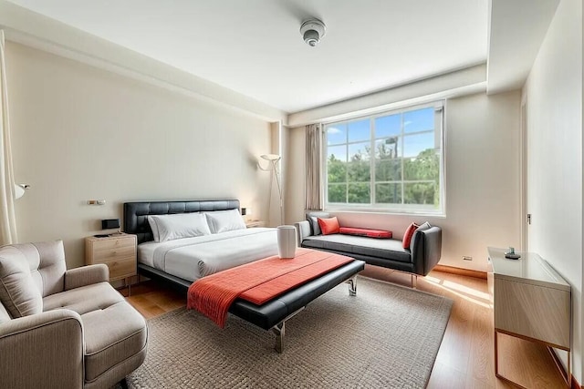 bedroom with hardwood / wood-style floors