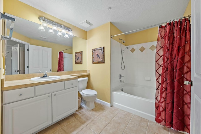 full bathroom with tile patterned flooring, shower / tub combo, a textured ceiling, and vanity