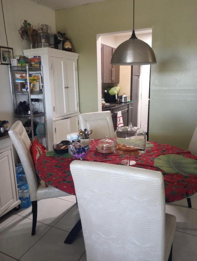 dining room featuring light tile patterned floors