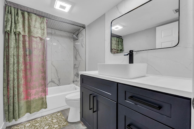 full bathroom featuring vanity, backsplash, tile patterned flooring, toilet, and shower / tub combo