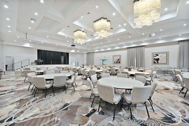 dining area with recessed lighting, coffered ceiling, visible vents, and a high ceiling