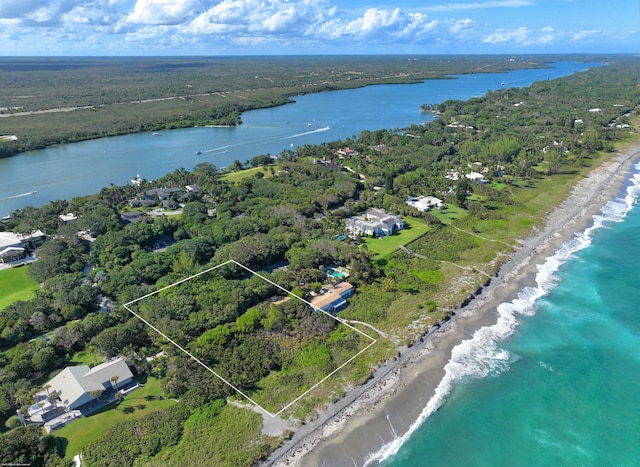 bird's eye view with a water view