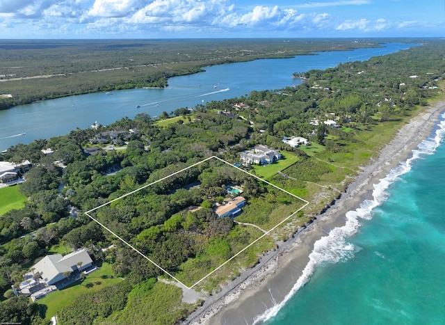 drone / aerial view featuring a water view