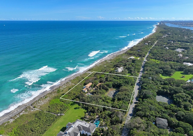 aerial view featuring a beach view and a water view