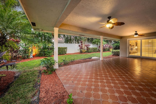 view of patio / terrace featuring ceiling fan