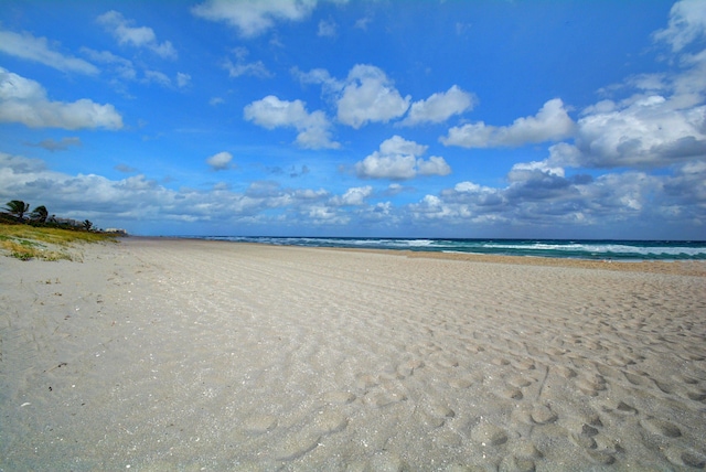 property view of water with a beach view