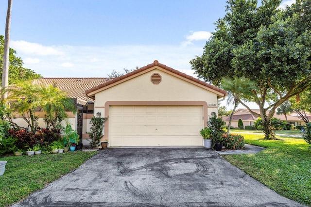 mediterranean / spanish-style home with a front lawn