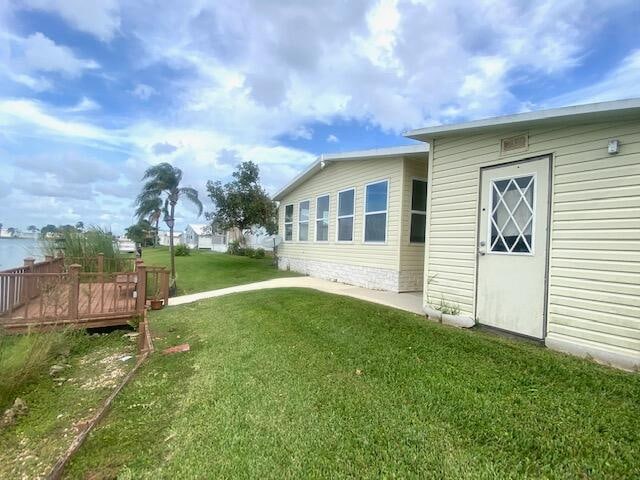 view of yard with a deck