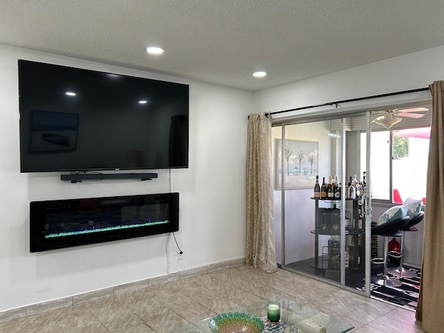 living room featuring a textured ceiling