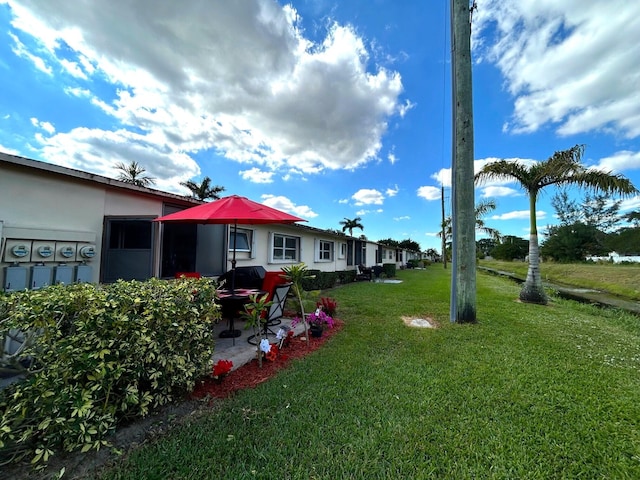 view of yard with a patio area