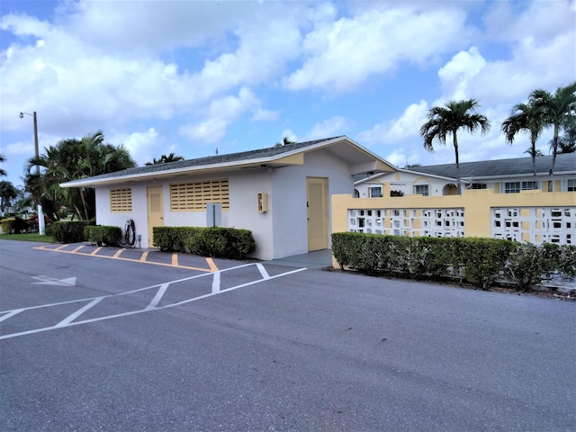2522 Emory Dr E Unit I, West Palm Beach, FL 33415 - view of building exterior with uncovered parking