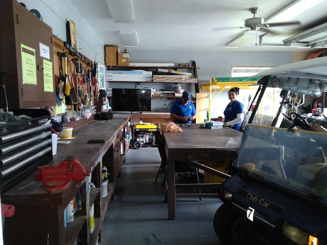 2522 Emory Dr E Unit I, West Palm Beach, FL 33415 - garage with a workshop area and a ceiling fan
