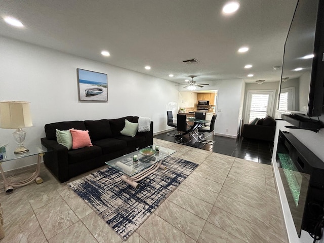 living room with ceiling fan