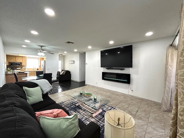 living room with ceiling fan