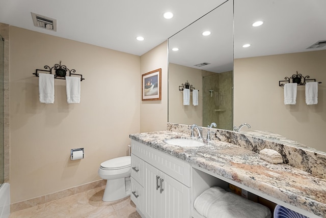 bathroom with vanity, toilet, and a shower with shower door