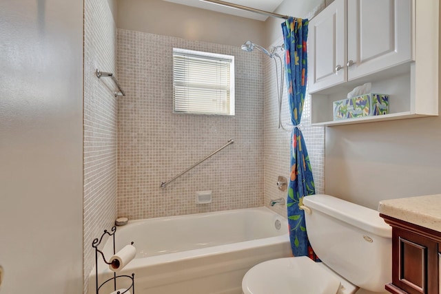 full bathroom featuring vanity, shower / bath combination with curtain, and toilet