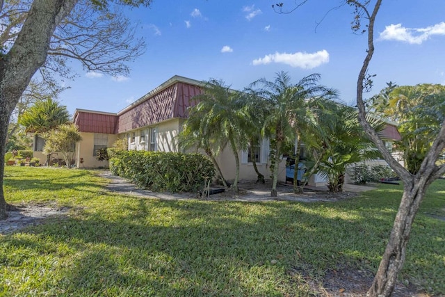 exterior space featuring a yard