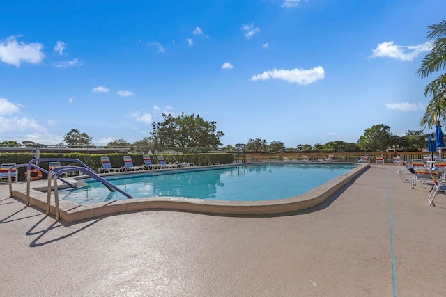 view of pool with a patio area