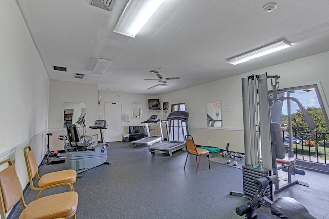 exercise room featuring ceiling fan