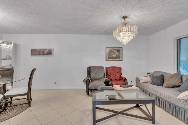 tiled living room with a textured ceiling and an inviting chandelier