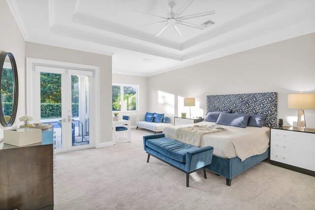 bedroom with arched walkways, light carpet, crown molding, and baseboards