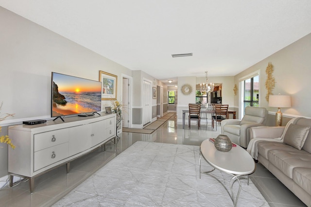 living room featuring an inviting chandelier