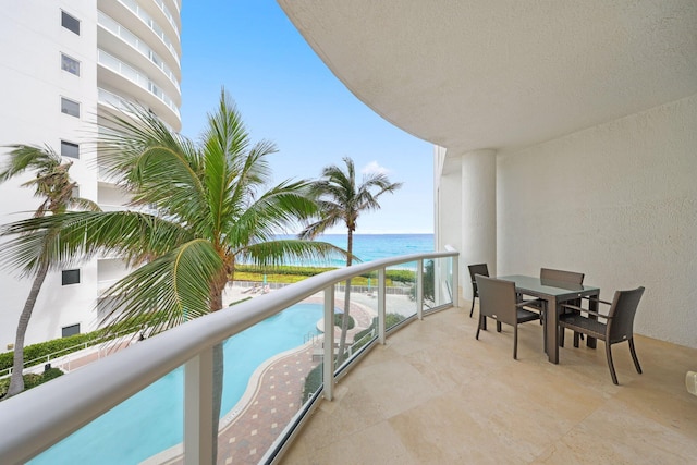 balcony featuring a water view