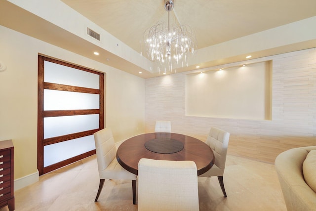 dining room featuring a chandelier