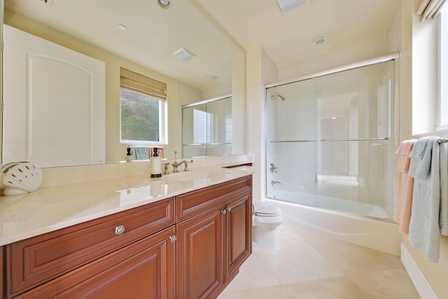 full bathroom with toilet, combined bath / shower with glass door, and vanity