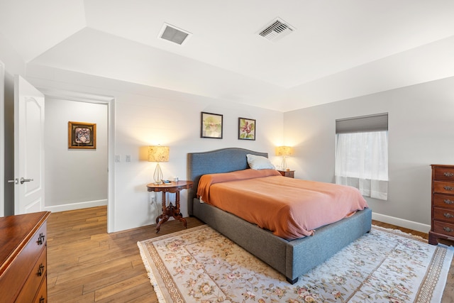 bedroom with light wood-type flooring