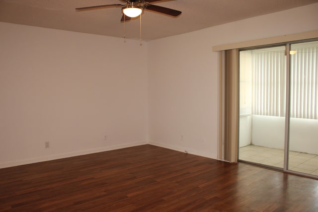 spare room featuring a textured ceiling, hardwood / wood-style flooring, and ceiling fan