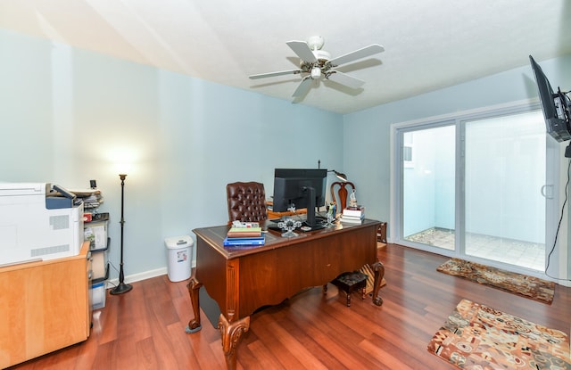 office area with hardwood / wood-style floors and ceiling fan