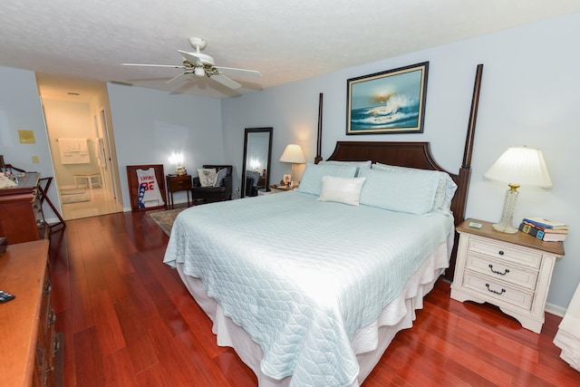 bedroom featuring ceiling fan and dark hardwood / wood-style flooring