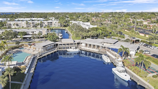 birds eye view of property featuring a water view