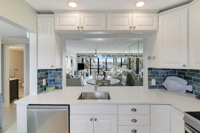 kitchen with white cabinets and stainless steel dishwasher