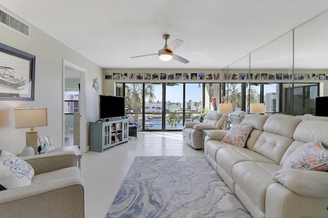 living room with ceiling fan