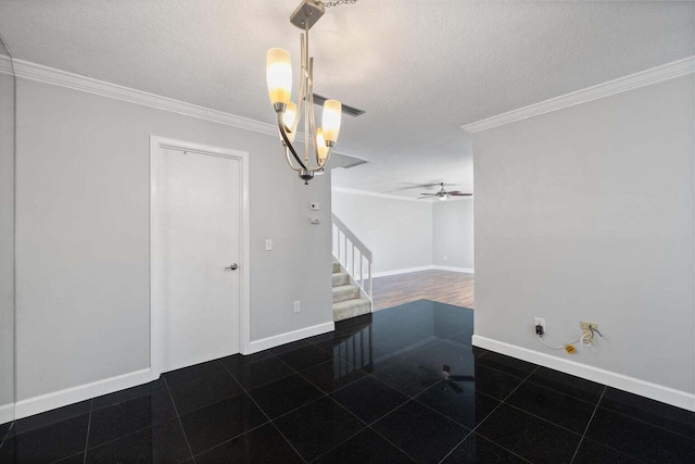 unfurnished room featuring ceiling fan, ornamental molding, and a textured ceiling