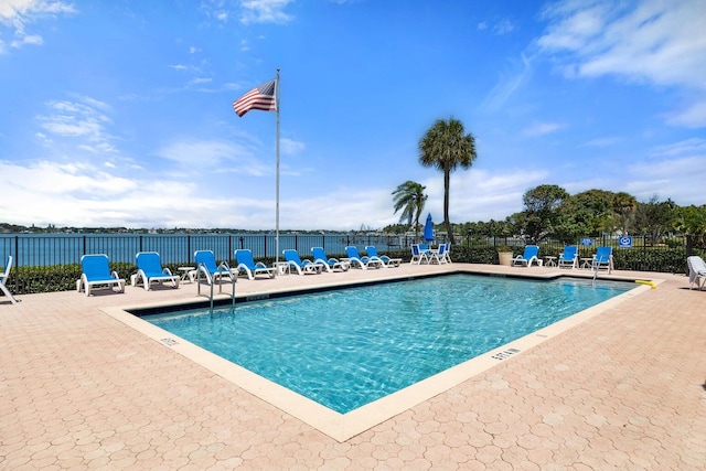 view of swimming pool featuring a patio area