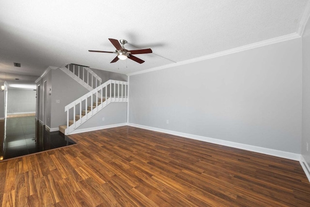 unfurnished living room with a textured ceiling, crown molding, ceiling fan, and dark hardwood / wood-style floors