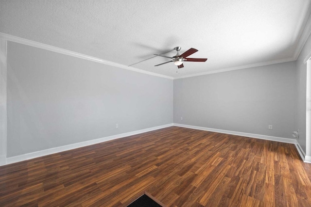 spare room featuring a textured ceiling, dark hardwood / wood-style flooring, ceiling fan, and ornamental molding