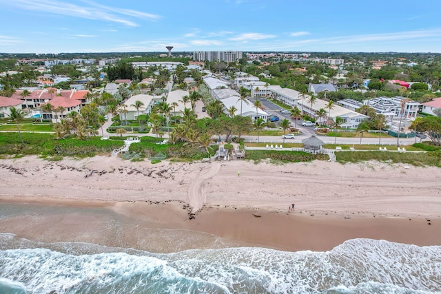 bird's eye view with a view of the beach and a water view