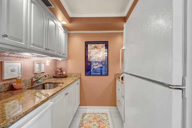 kitchen with white cabinets, white appliances, crown molding, and sink