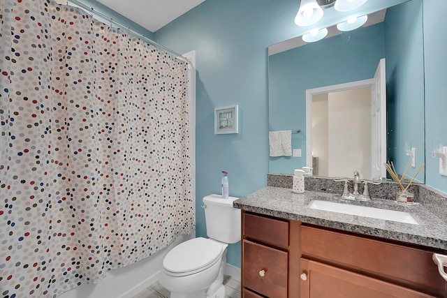 full bathroom featuring vanity, toilet, and shower / tub combo