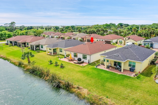 bird's eye view with a water view