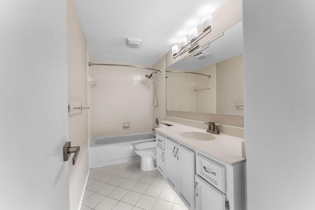 full bathroom with toilet, vanity, tile patterned flooring, and tiled shower / bath