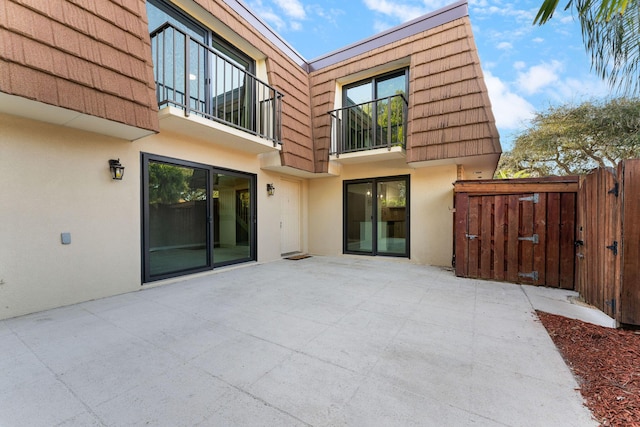 rear view of property with a patio area